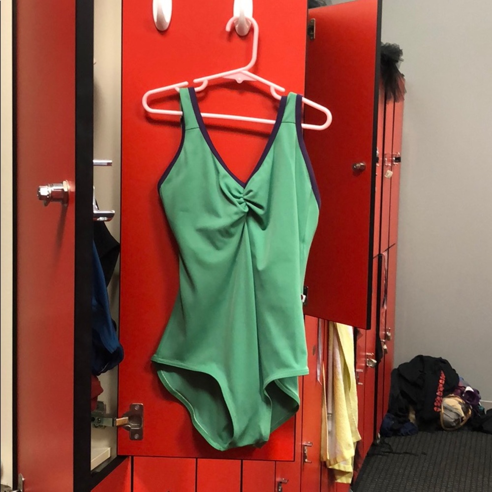 Yumiko green Leo with dark purple trim